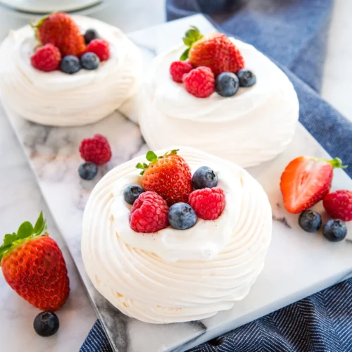meringue nests with berries and vanilla cream 1 2